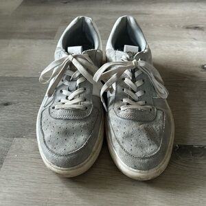 Grey and white Calvin Klein sneakers